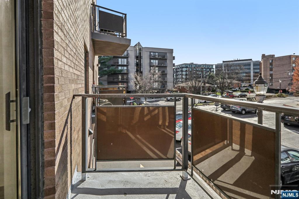 279 Clark Street, Unit A7 Hackensack, NJ 07601 - Photo 29 of 34 a view of a balcony with city view