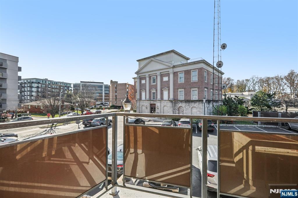 279 Clark Street, Unit A7 Hackensack, NJ 07601 - Photo 30 of 34 a view of a city with tall buildings