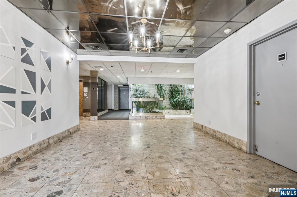 279 Clark Street, Unit A7 Hackensack, NJ 07601 - Photo 6 of 34 a view of a indoor garage