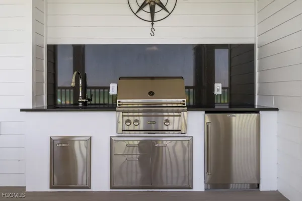 a kitchen with a stove and a microwave