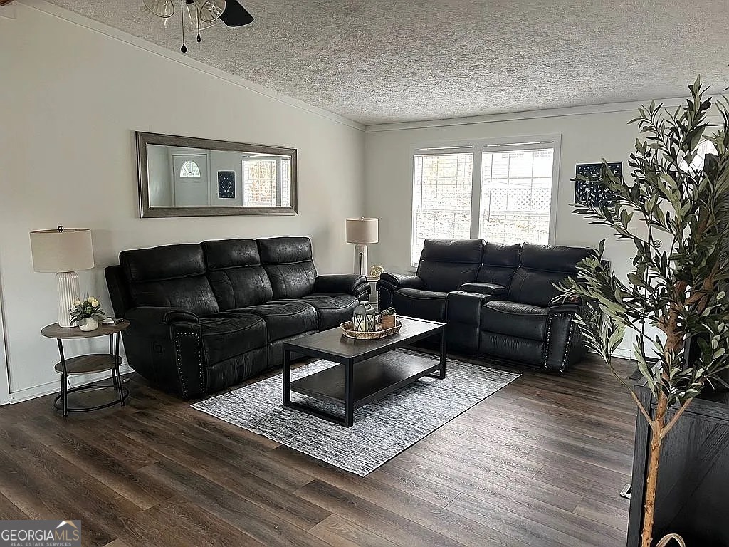 135 Southshore Road Eatonton, GA 31024 - Photo 5 of 13 a living room with furniture and a window