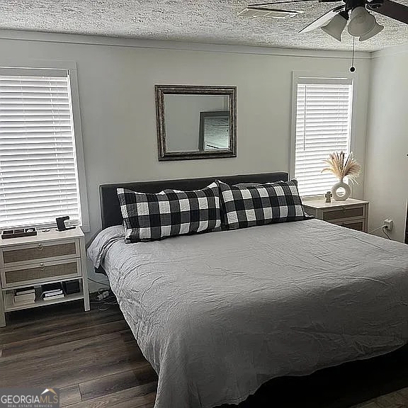 135 Southshore Road Eatonton, GA 31024 - Photo 7 of 13 a bedroom with a bed and window