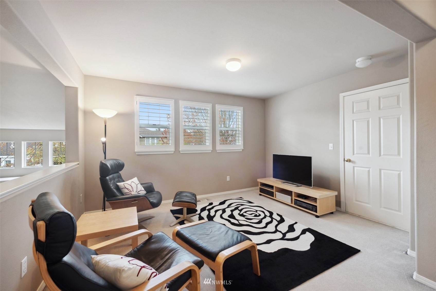 562 Chelan Place Northeast Renton, WA 98059 - Photo 14 of 27 a bedroom with furniture and a window