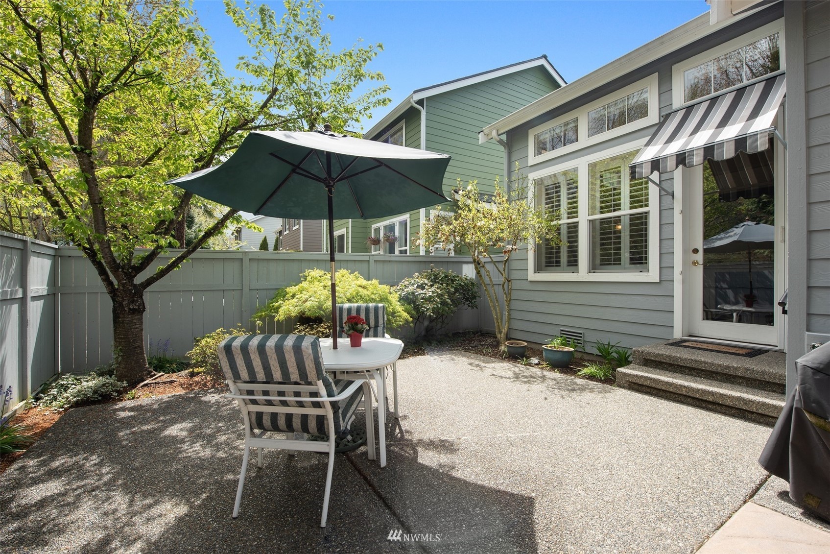 562 Chelan Place Northeast Renton, WA 98059 - Photo 21 of 27 a view of a chair and table in the patio