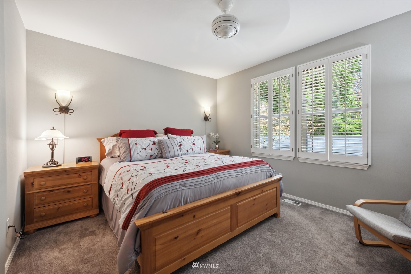 562 Chelan Place Northeast Renton, WA 98059 - Photo 10 of 27 a bed sitting in a bedroom next to a window