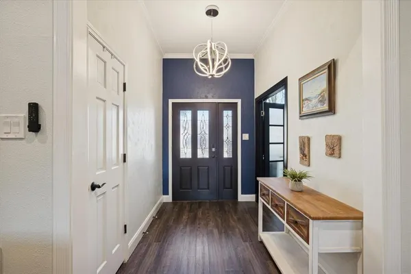 a room with furniture and a window