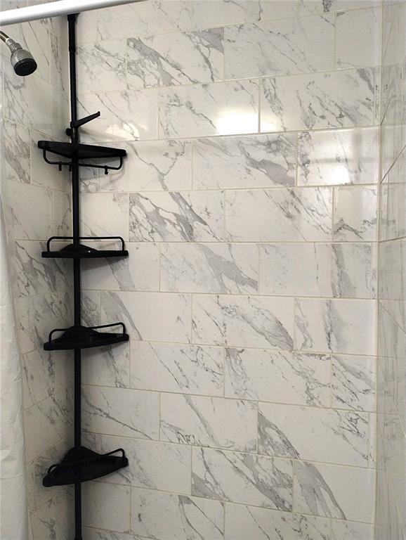 417 East Main Street Dundee, FL 33838 - Photo 19 of 24 a close view of shower tap