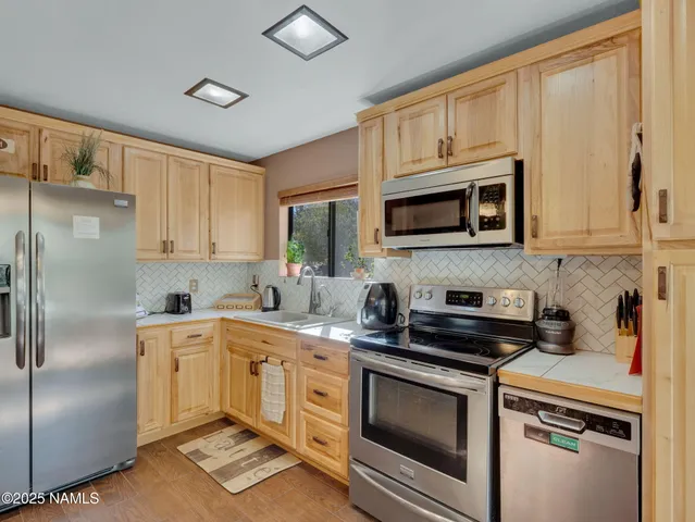 a bathroom with a sink toilet and a mirror