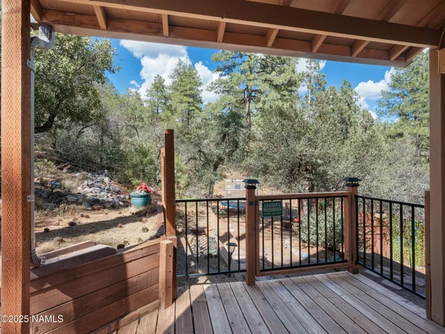 a view of a backyard with sitting area