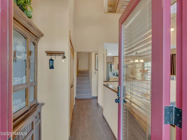 a view of living room with furniture and window