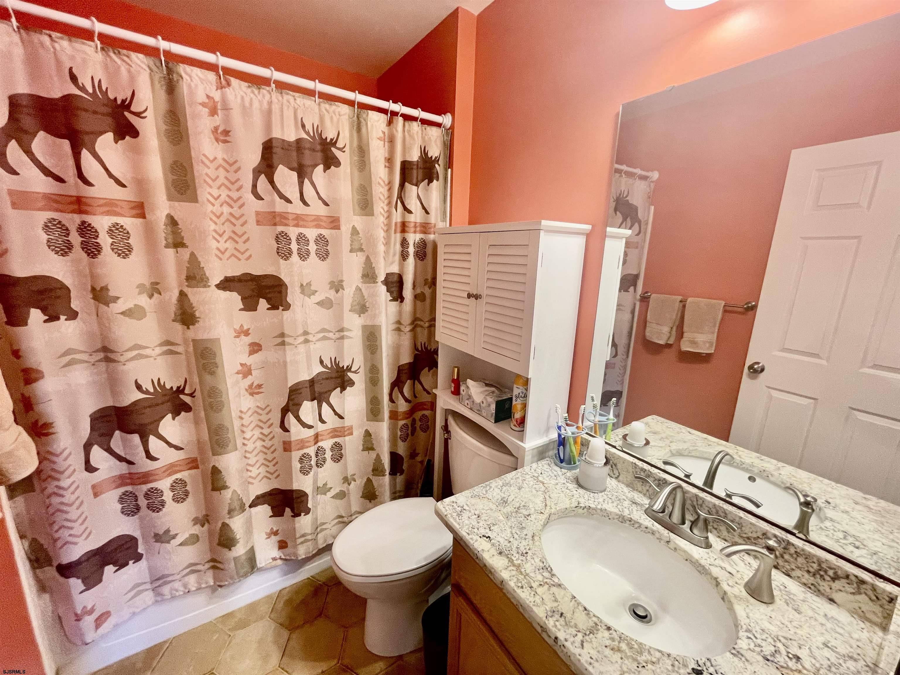 30 Cottage Road Egg Harbor Township, NJ 08234 - Photo 14 of 22 a bathroom with a sink toilet and shower