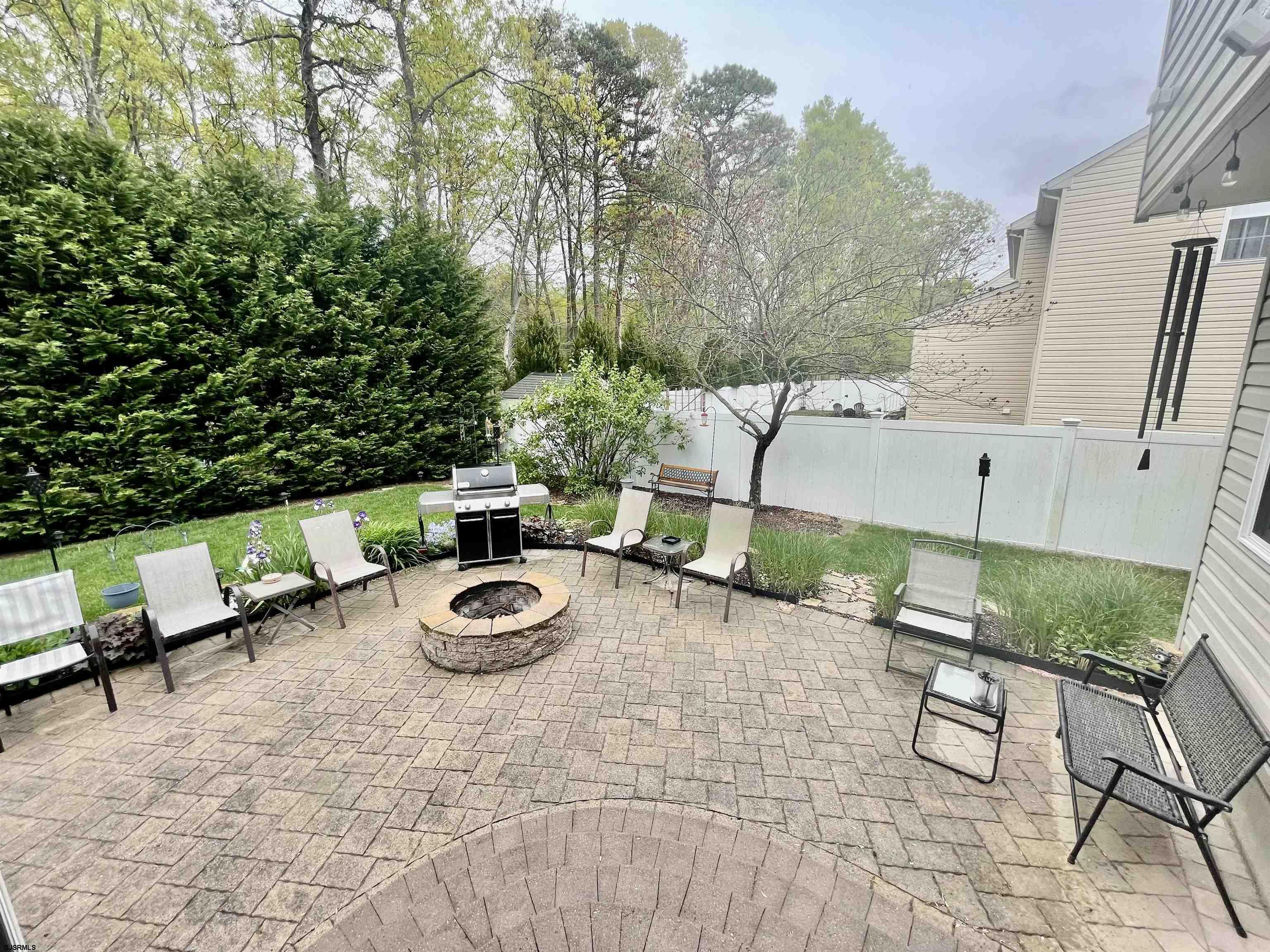 30 Cottage Road Egg Harbor Township, NJ 08234 - Photo 22 of 22 a backyard of a house with seating space