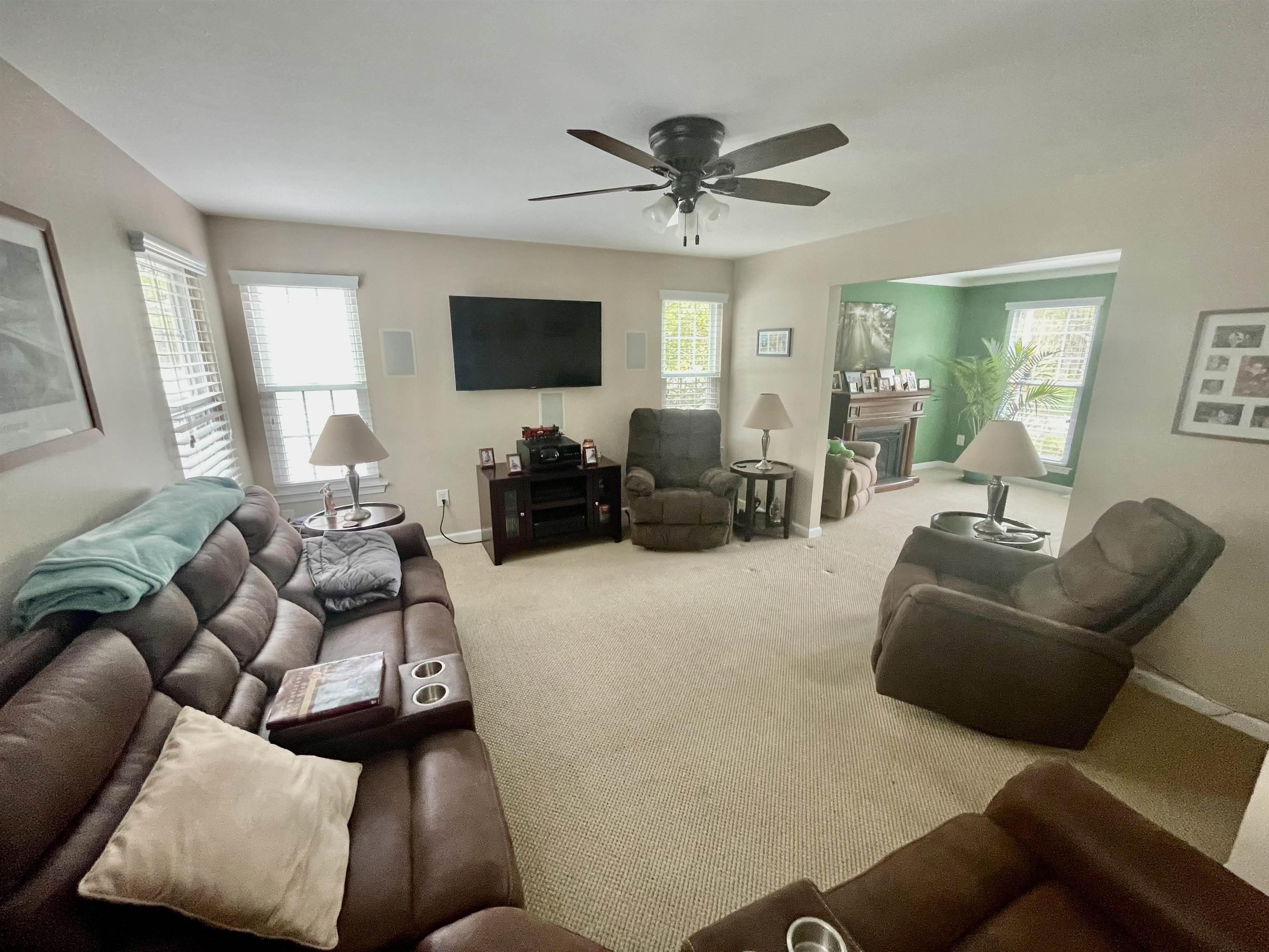 30 Cottage Road Egg Harbor Township, NJ 08234 - Photo 7 of 22 a living room with furniture and a flat screen tv
