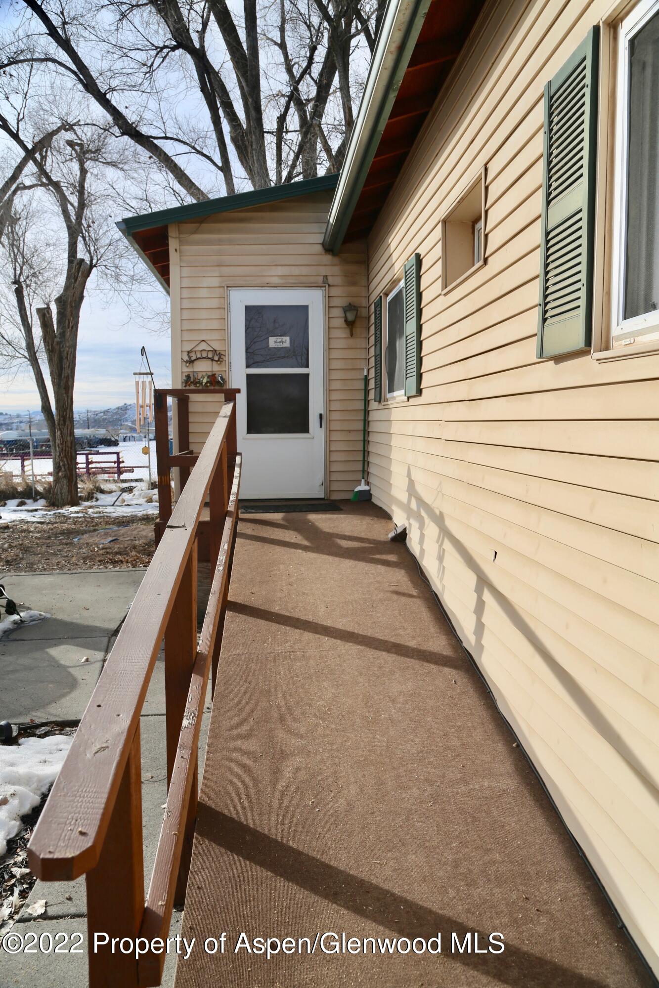 756 County Road 221 Rifle, CO 81650 - Photo 8 of 15 a view of a house with wooden stairs