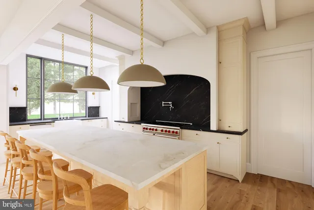 a hall with a stove and a flat screen tv