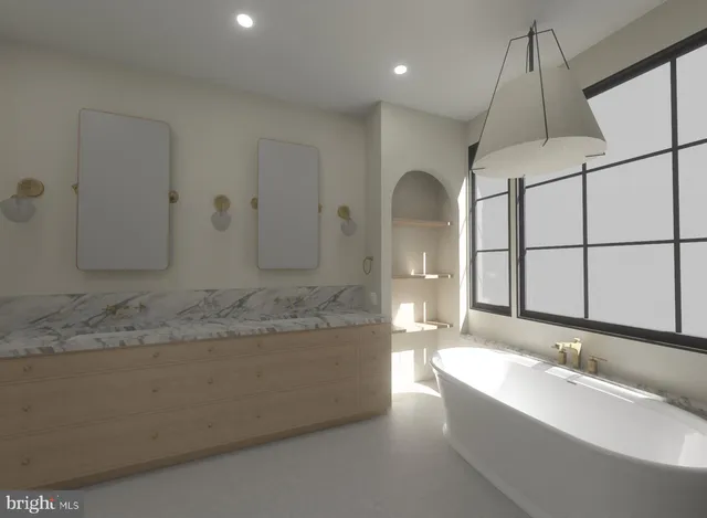 a bathroom with a granite countertop sink mirror and bathtub