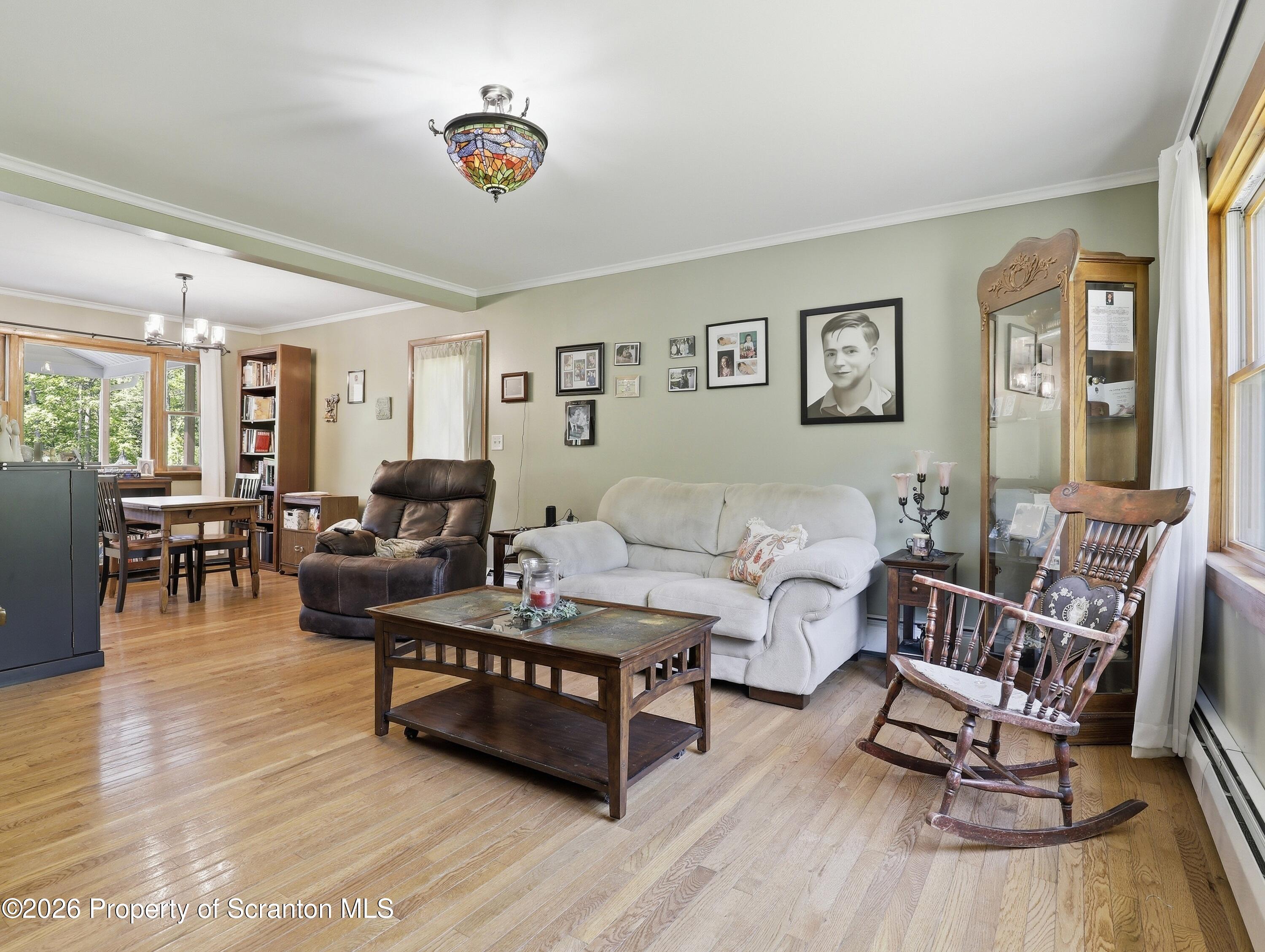 1237 Heart Lake Road Scott Township, PA 18433 - Photo 10 of 39 a living room with furniture and a wooden floor
