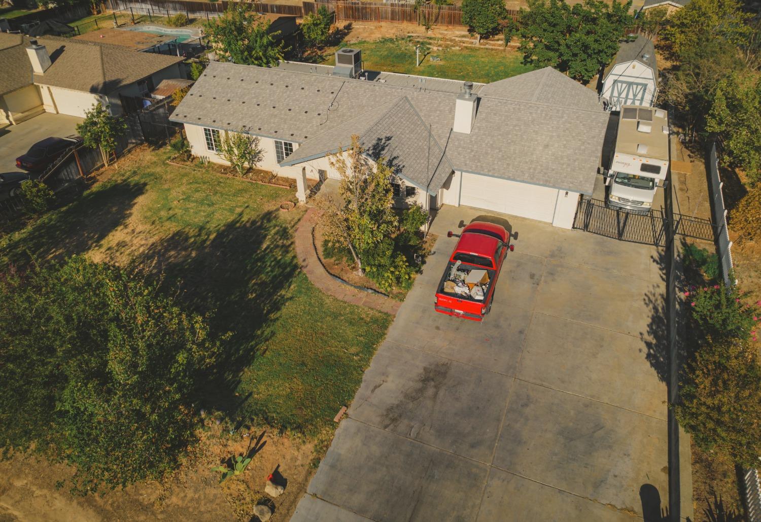 17313 Road 26 Madera, CA 93638 - Photo 14 of 15 an aerial view of residential houses with outdoor space