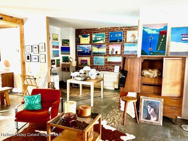 92 Partition Street Saugerties, NY 12477 - Photo 14 of 25 a outdoor living space with furniture and a fireplace