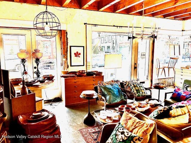 92 Partition Street Saugerties, NY 12477 - Photo 19 of 25 a room with furniture a rug and a window