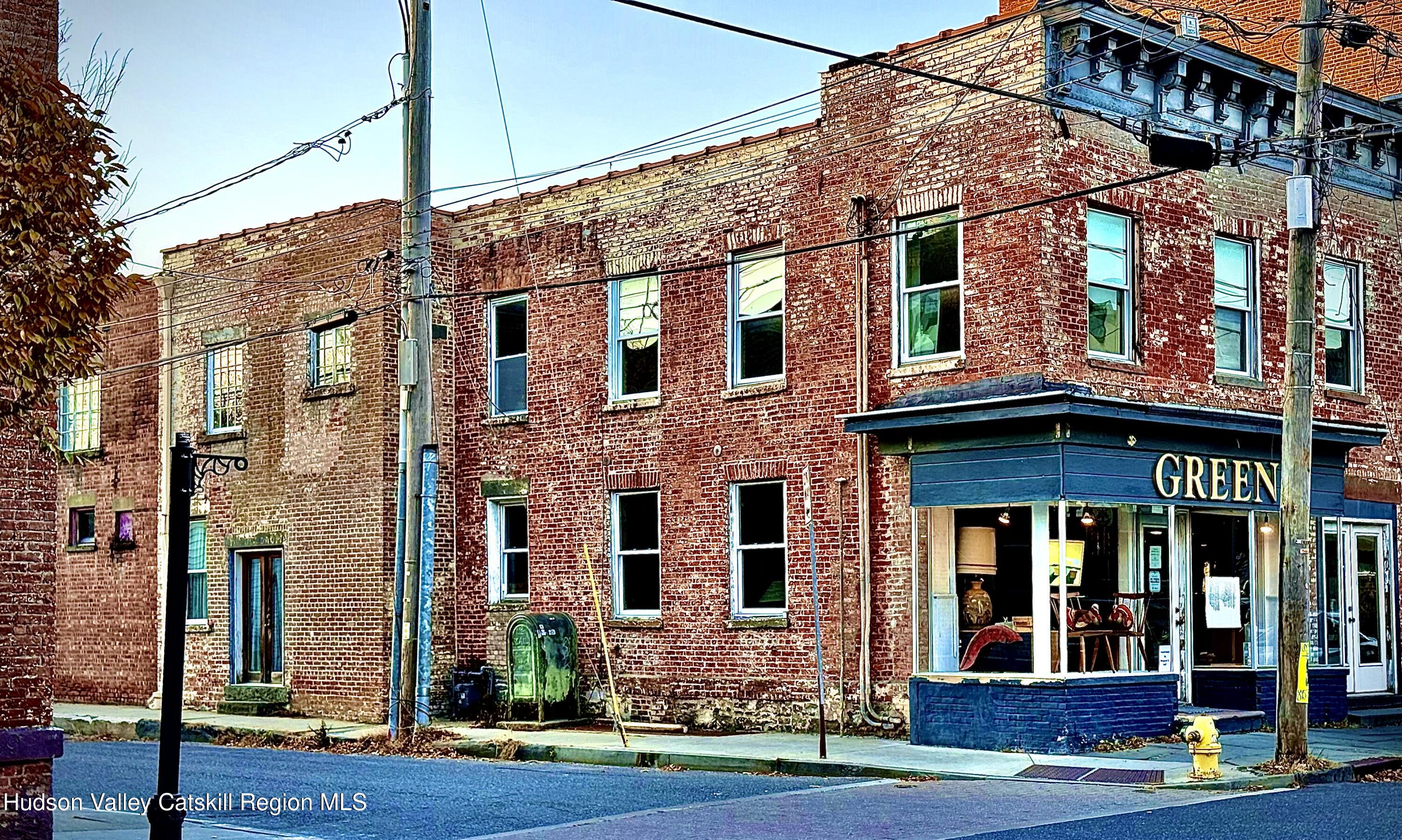 92 Partition Street Saugerties, NY 12477 - Photo 2 of 25 a view of a building with a yard
