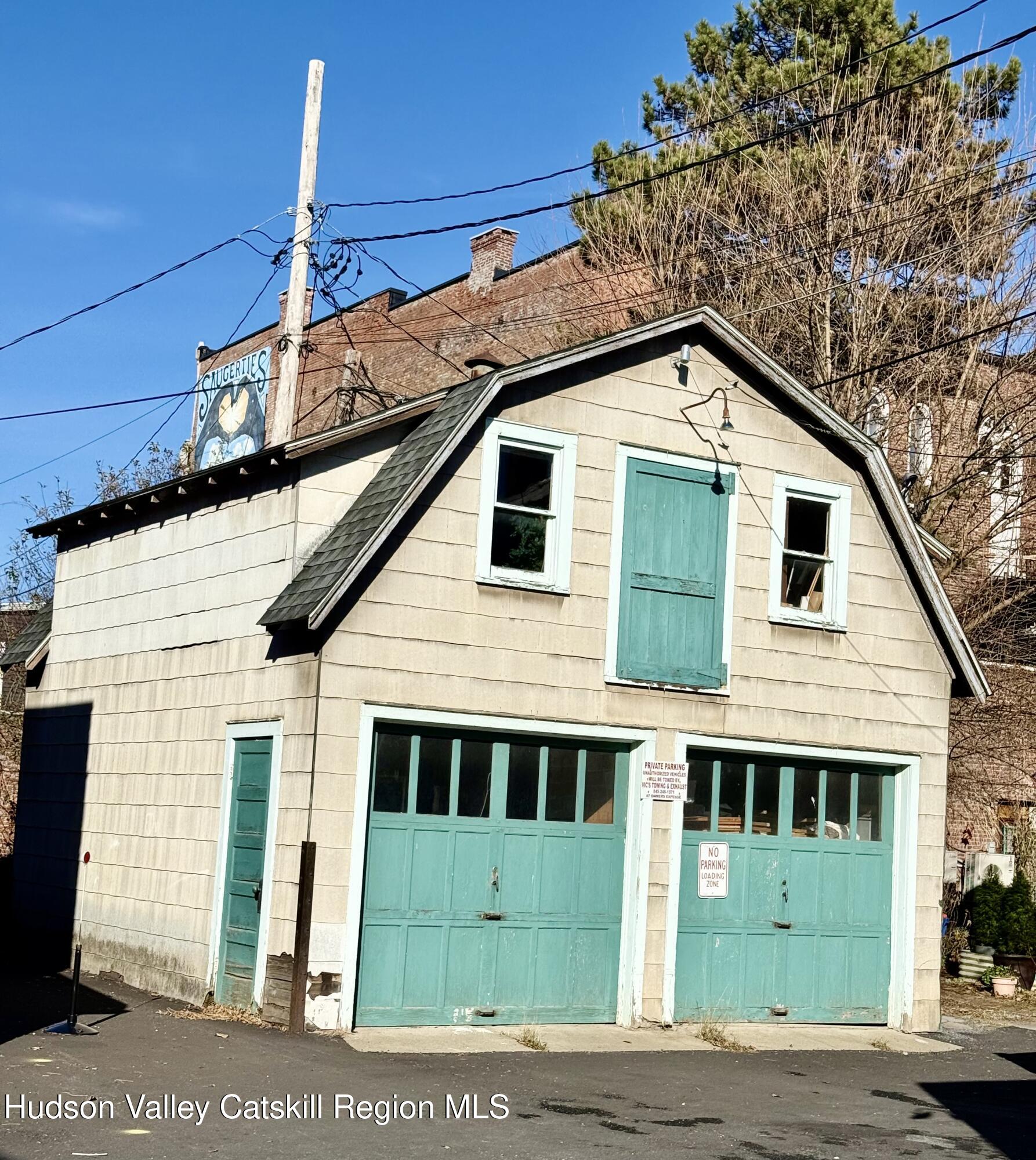 92 Partition Street Saugerties, NY 12477 - Photo 5 of 25 a front view of a house with a yard