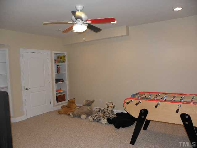 7009 Millstone Ridge Court Raleigh, NC 27614 - Photo 21 of 25 Used as a game room for the kids this is just one more of this homes fantastic features. The whole house intercom and distributed audio make monitoring the children easy and peace and quiet possible. Other