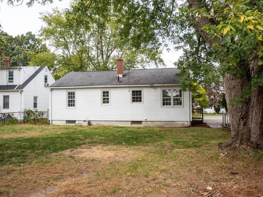 25 French Street Springfield, MA 01104 - Photo 3 of 16 a front view of a house with a garden
