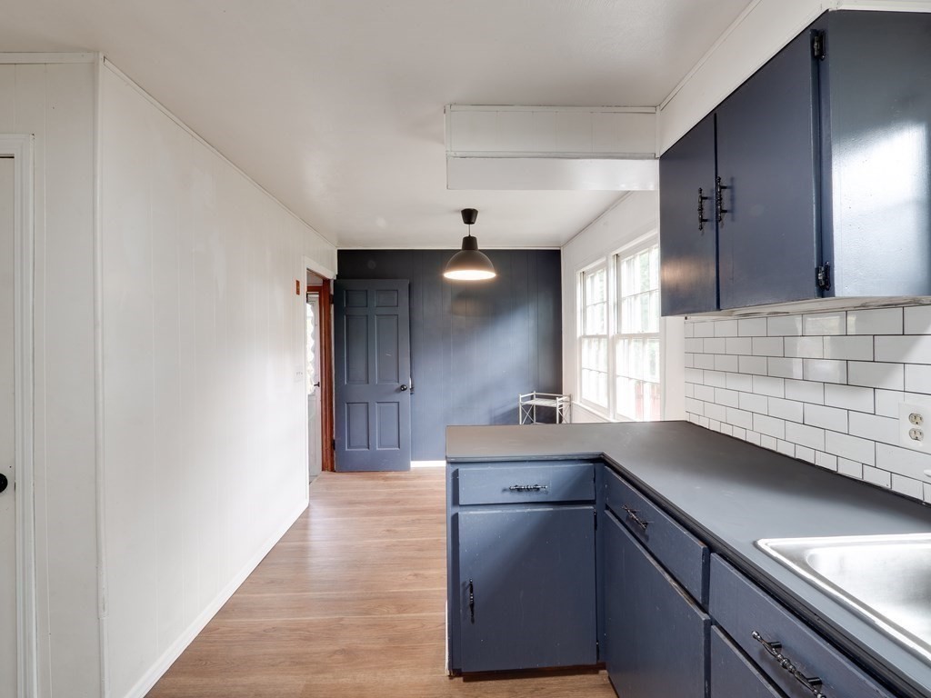 25 French Street Springfield, MA 01104 - Photo 5 of 16 a kitchen with stainless steel appliances a sink and cabinets