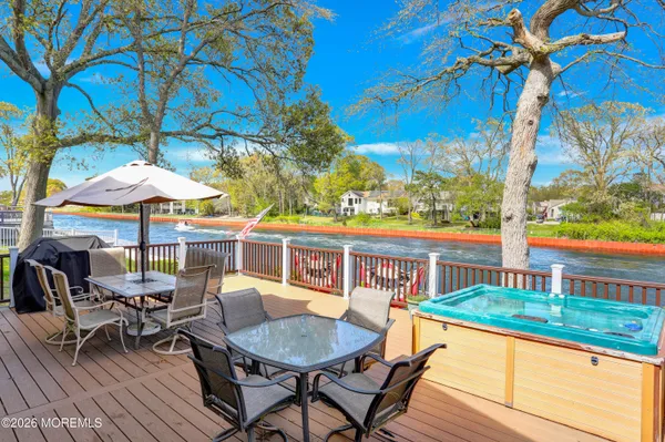 an outdoor space with furniture and umbrella