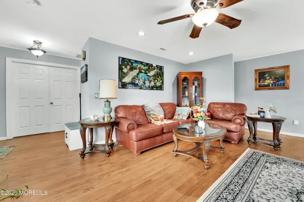 a living room with furniture and a rug