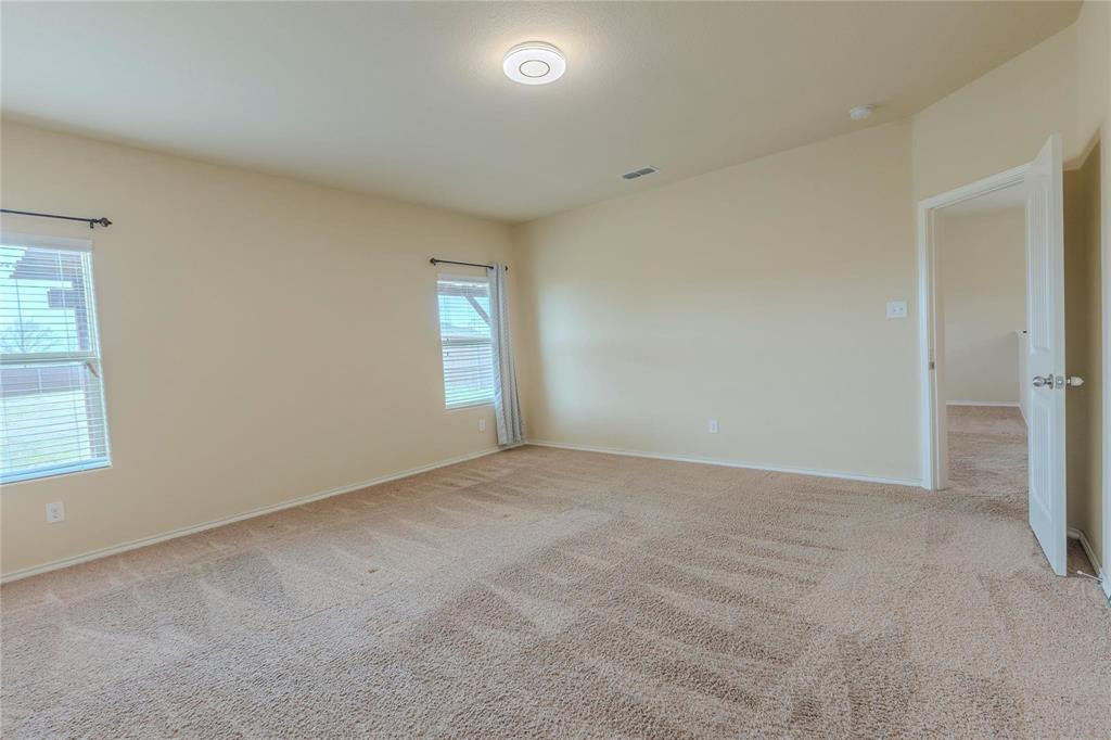 5157 Grayson Ridge Drive Fort Worth, TX 76179 - Photo 18 of 34 a view of an empty room with a window