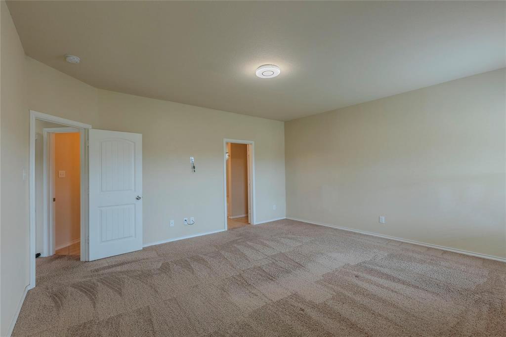 5157 Grayson Ridge Drive Fort Worth, TX 76179 - Photo 23 of 34 a view of an empty room