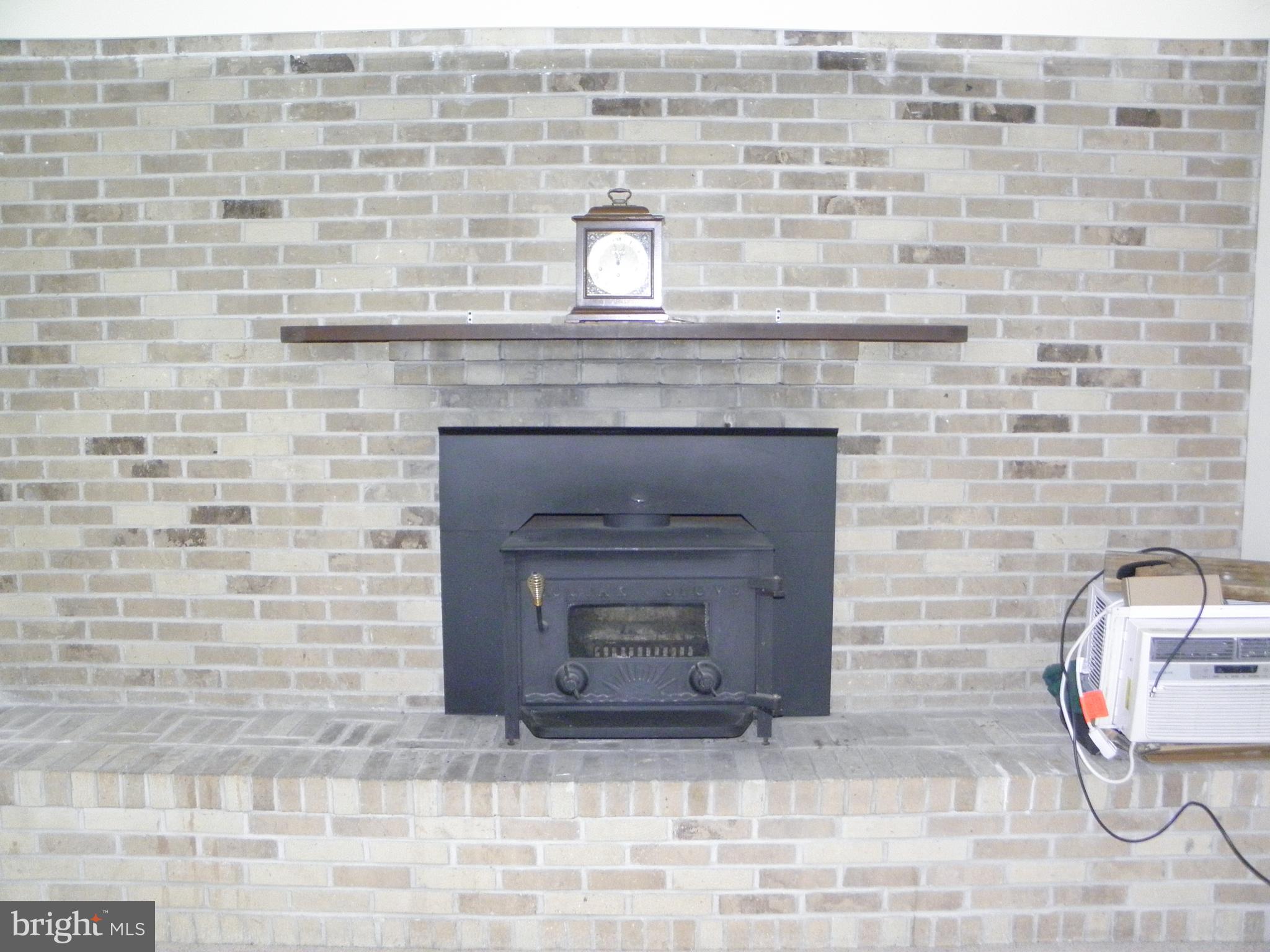 9218 Nottingwood Road Rosedale, MD 21237 - Photo 15 of 28 Wood Stove