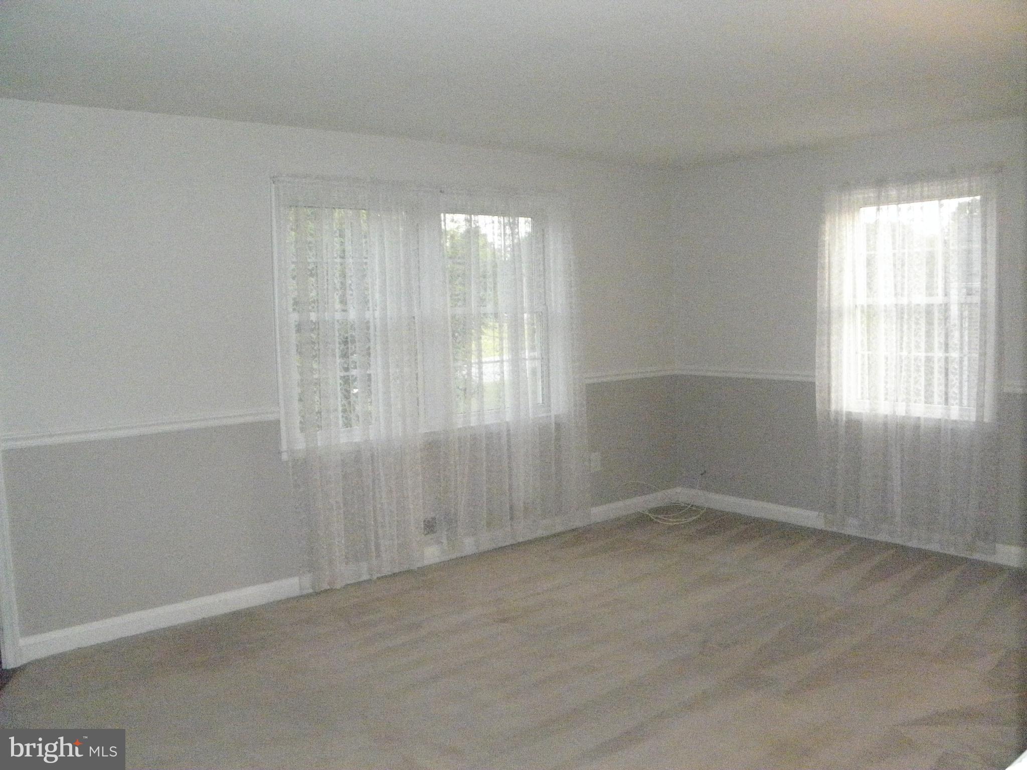 9218 Nottingwood Road Rosedale, MD 21237 - Photo 4 of 28 Sunlit filled Living Room