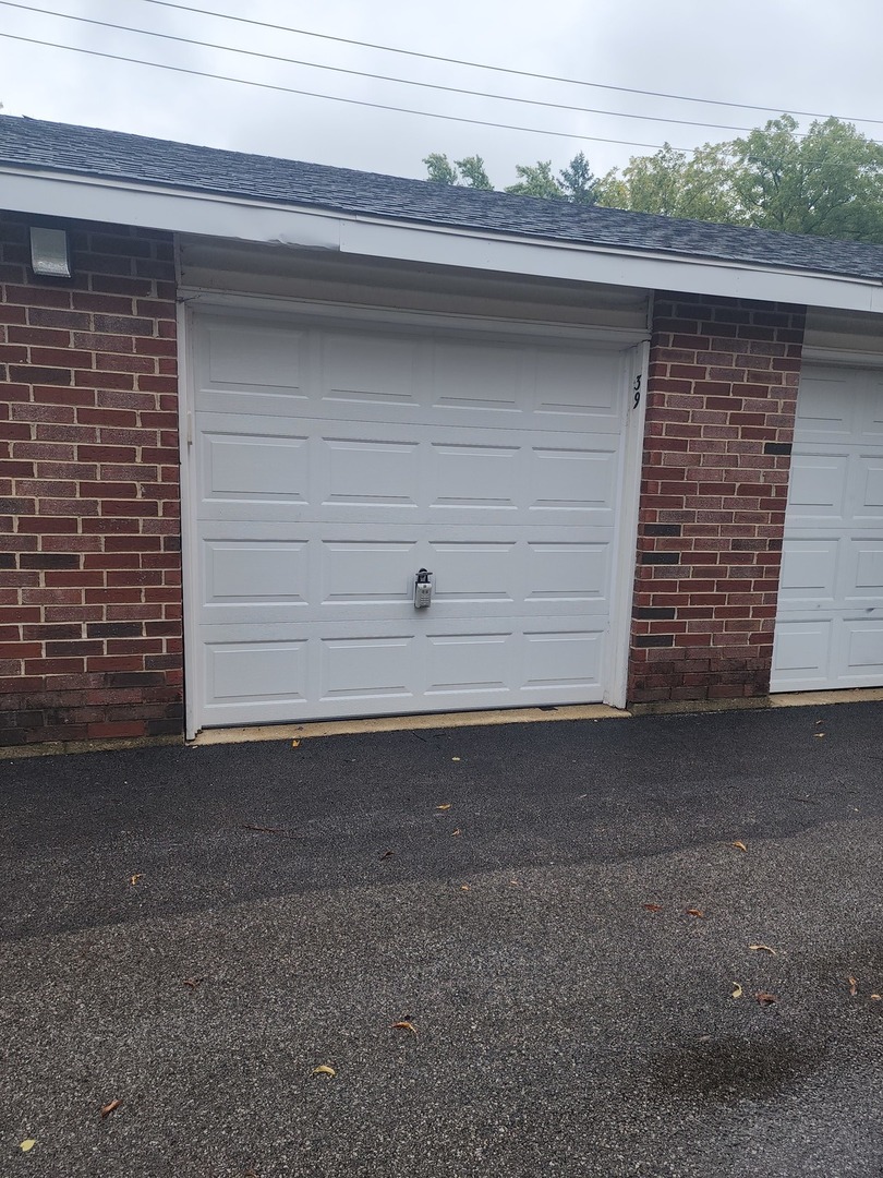 501 Leah Lane, Unit 2A Woodstock, IL 60098 - Photo 13 of 13 a close up of a fireplace