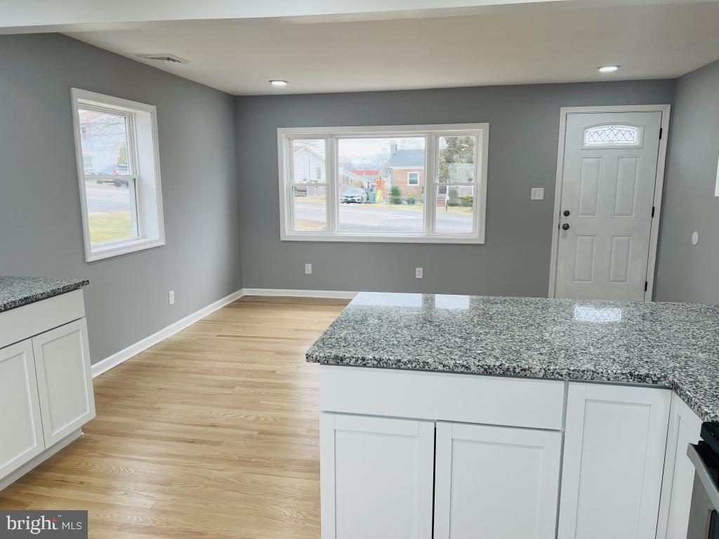 34 Compass Road East Middle River, MD 21220 - Photo 2 of 5 a view of kitchen with granite countertop cabinets and window