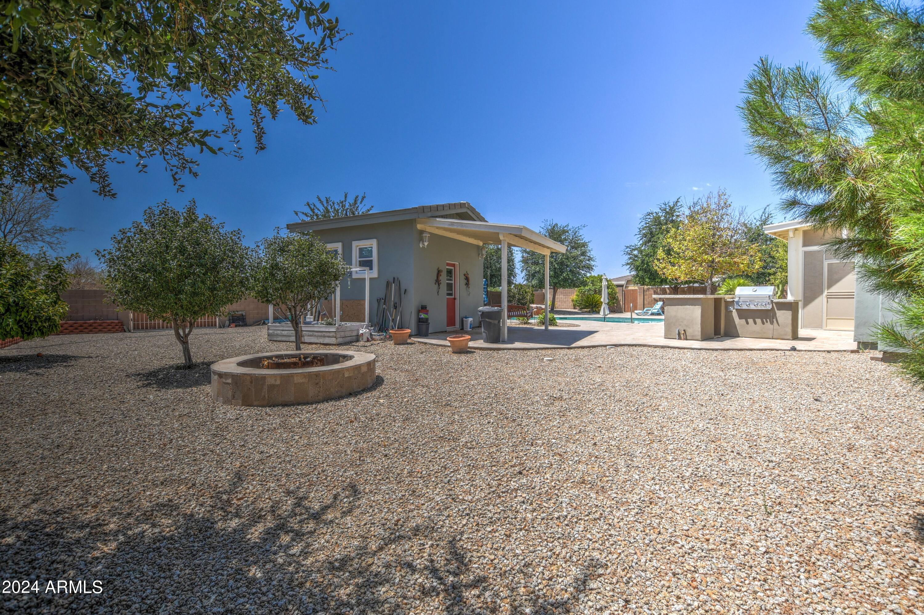 907 West Restin Road Phoenix, AZ 85086 - Photo 47 of 55 Pool House with Fire Pit and BBQ