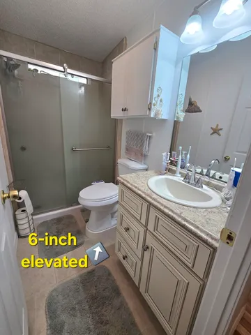 a view of a backyard with sitting area