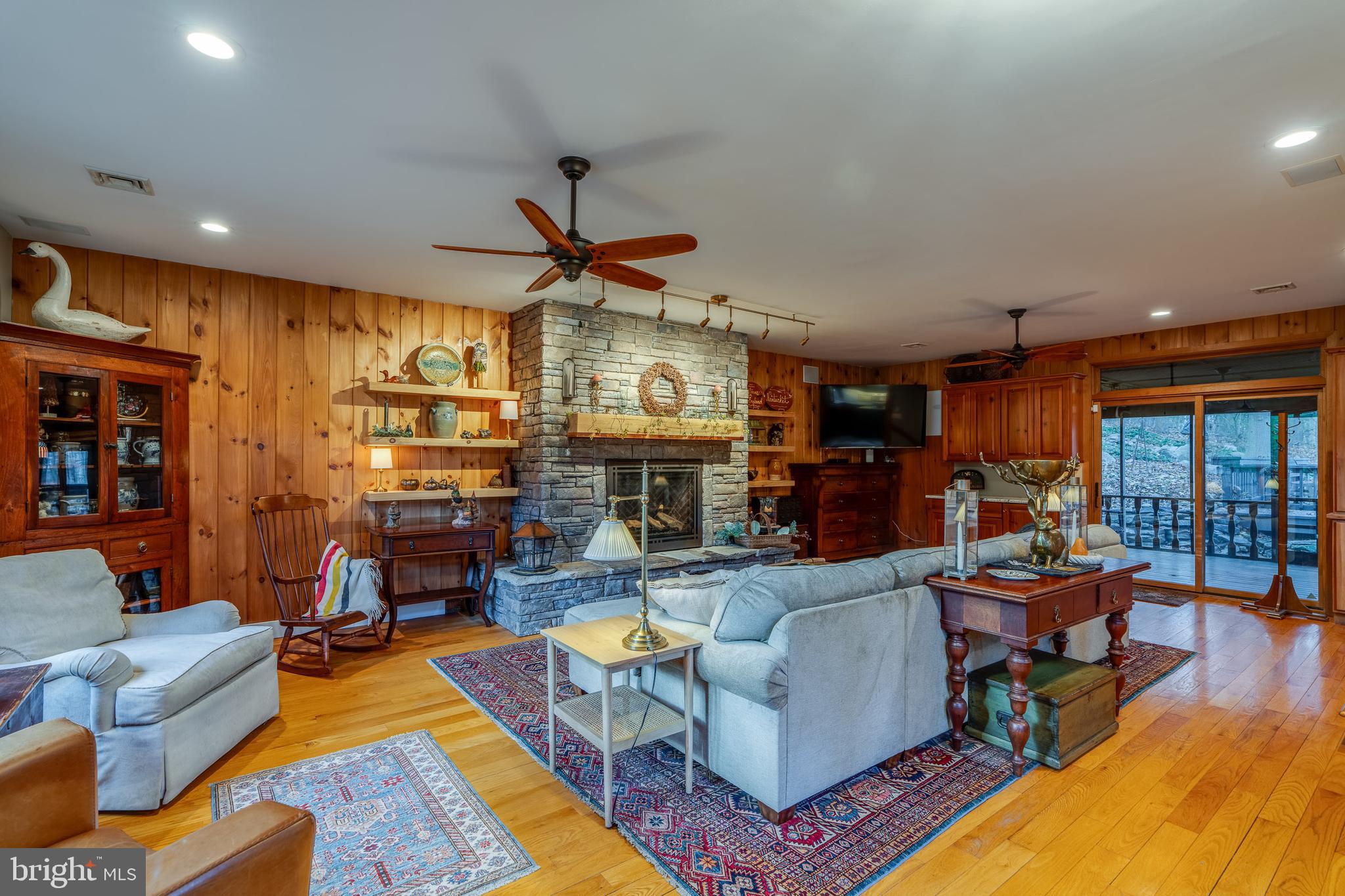 181 Old Mine Road Lebanon, PA 17042 - Photo 11 of 79 a living room with fireplace furniture and a large window