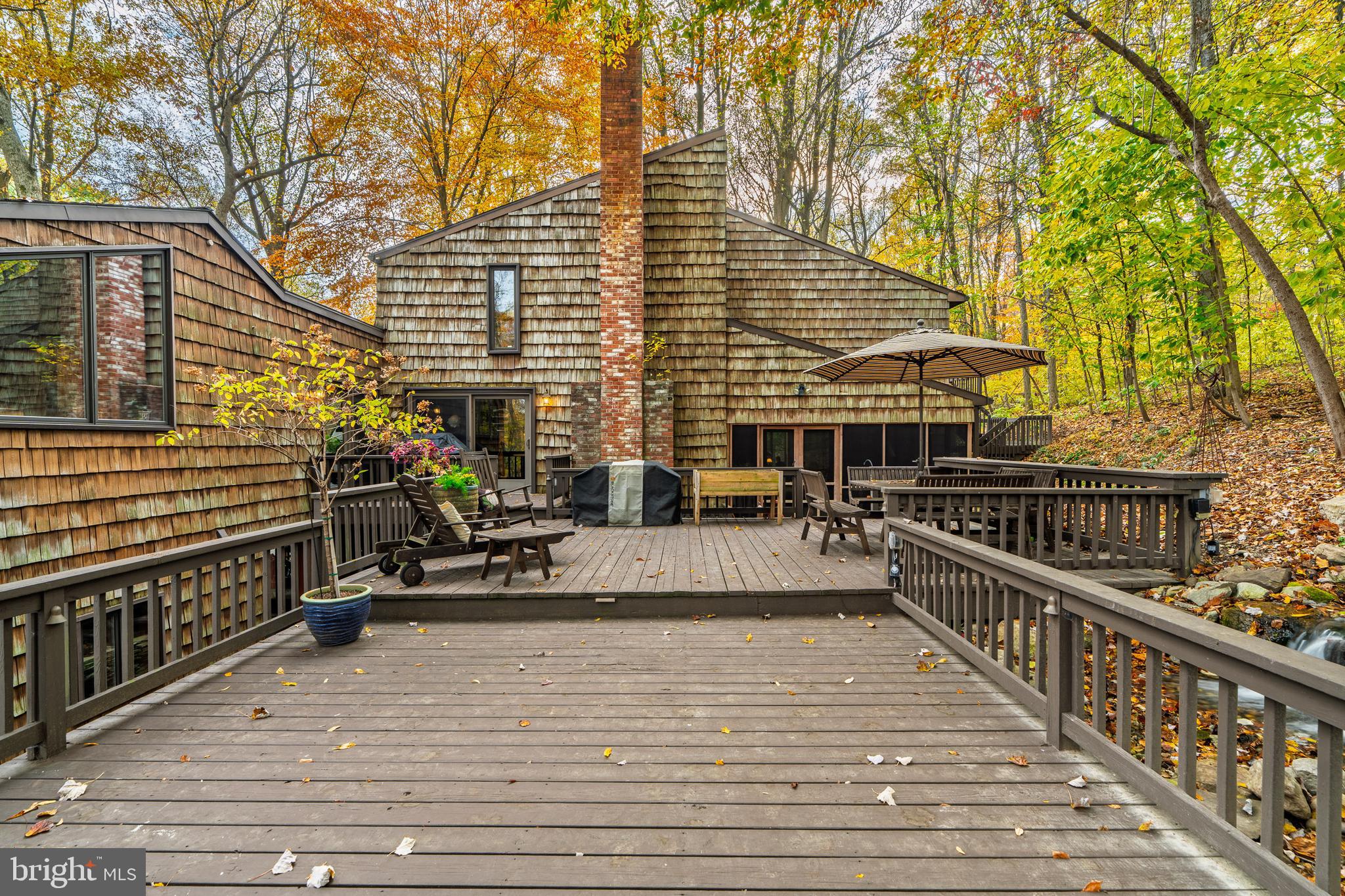 181 Old Mine Road Lebanon, PA 17042 - Photo 64 of 79 a view of a balcony with two couches and wooden floor
