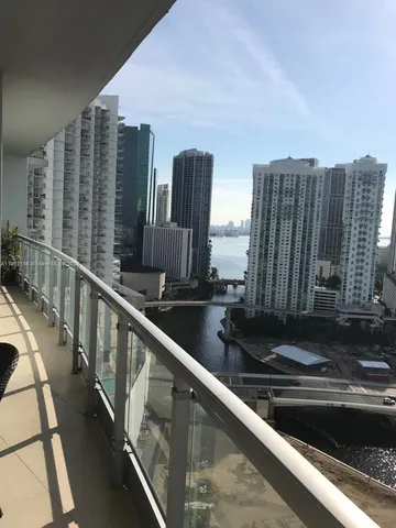 a view of balcony with furniture
