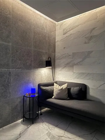 a bathroom with a tub and a sink