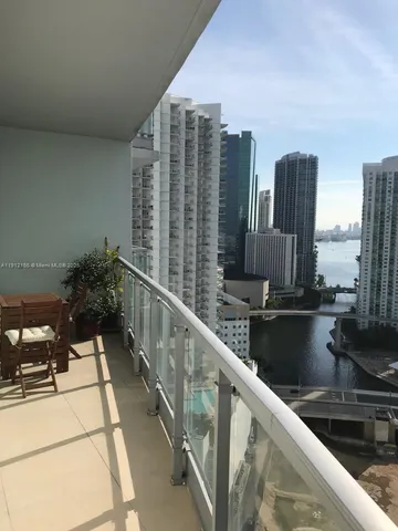 a view of balcony with a potted plant