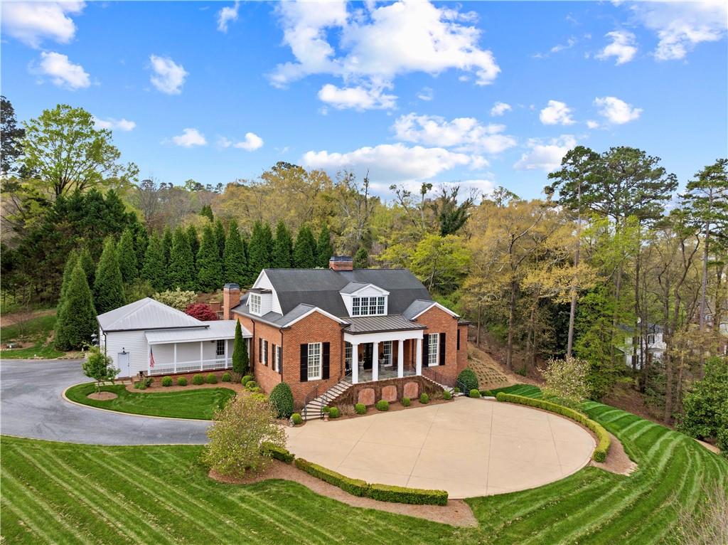a view of a house with a big yard