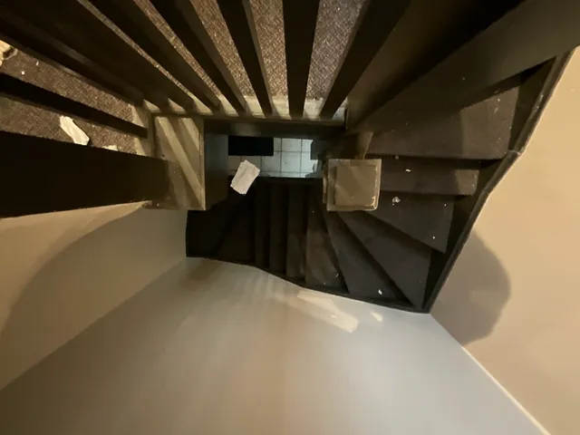 a kitchen with a refrigerator a stove top oven a sink and dishwasher