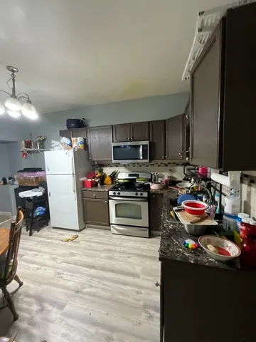 a bedroom with bed and a window