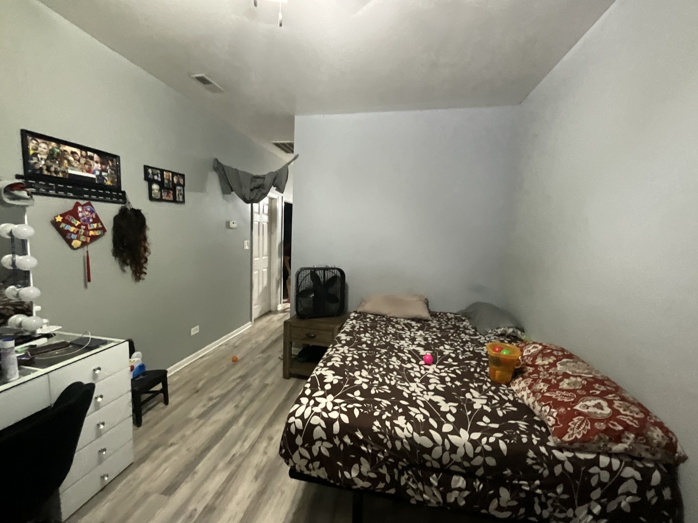 4226 West Ogden Avenue Chicago, IL 60623 - Photo 17 of 20 a bedroom with bed and a window