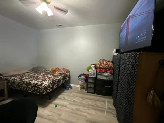 a kitchen with a stove a sink and a microwave