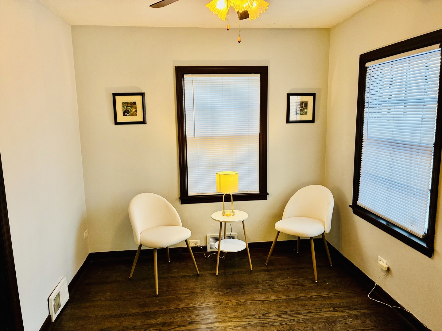 14506 Clinton Street Harvey, IL 60426 - Photo 3 of 12 a view of a dining room with furniture and wooden floor